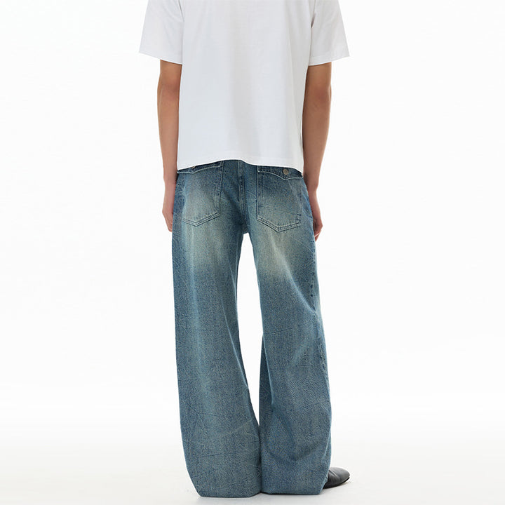 Men's ultra-wide cut denim baggy jeans with striking whisker accents and floor-length hem Mune Fashion