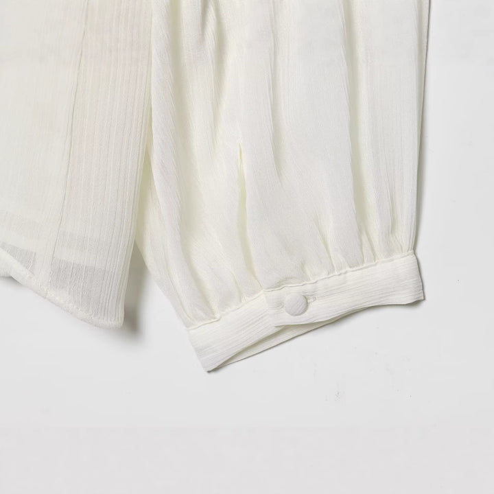 Women’s chiffon blouse with ruffle detail and pleated bust area Mune Fashion
