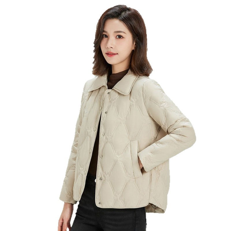 Women Short Cut Quilted Jacket with Decorative Stitching and Rounded Hem Mune Fashion