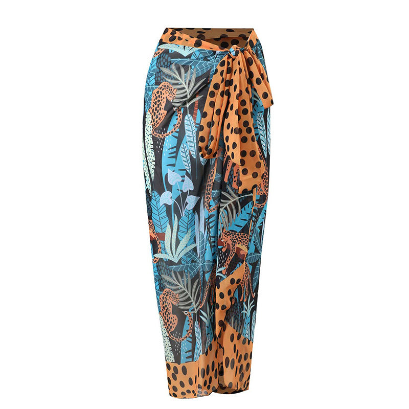 Women's one-piece swimsuit with playful ruffle design and floral wrap skirt Mune Fashion