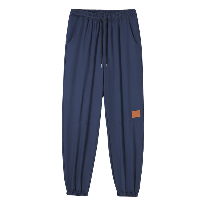 Men's sporty casual pants with elastic waistband and multifunctional pockets Mune Fashion