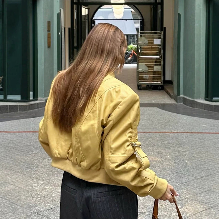 Women's short bomber jacket in boxy cut with distinctive seam details, zipper pockets and ribbed cuffs Mune Fashion