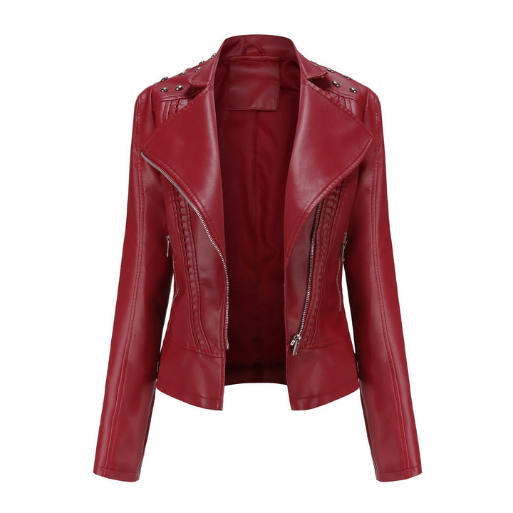 Women's cropped biker jacket made of faux leather with studs and asymmetrical zipper Mune Fashion