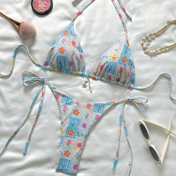 Ladies triangle bikini with playful flower details Mune Fashion