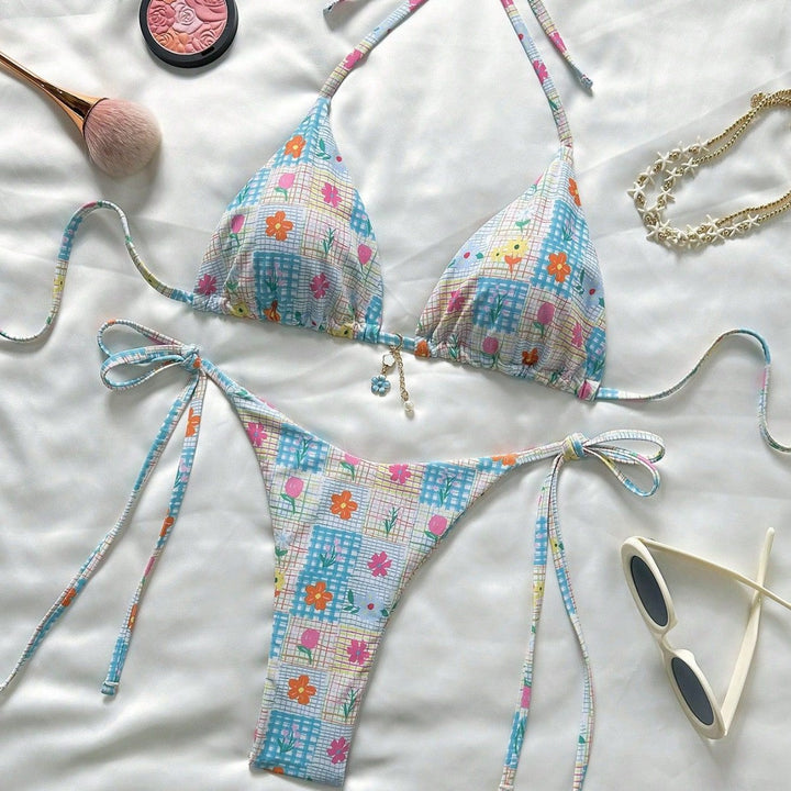 Ladies triangle bikini with playful flower details Mune Fashion