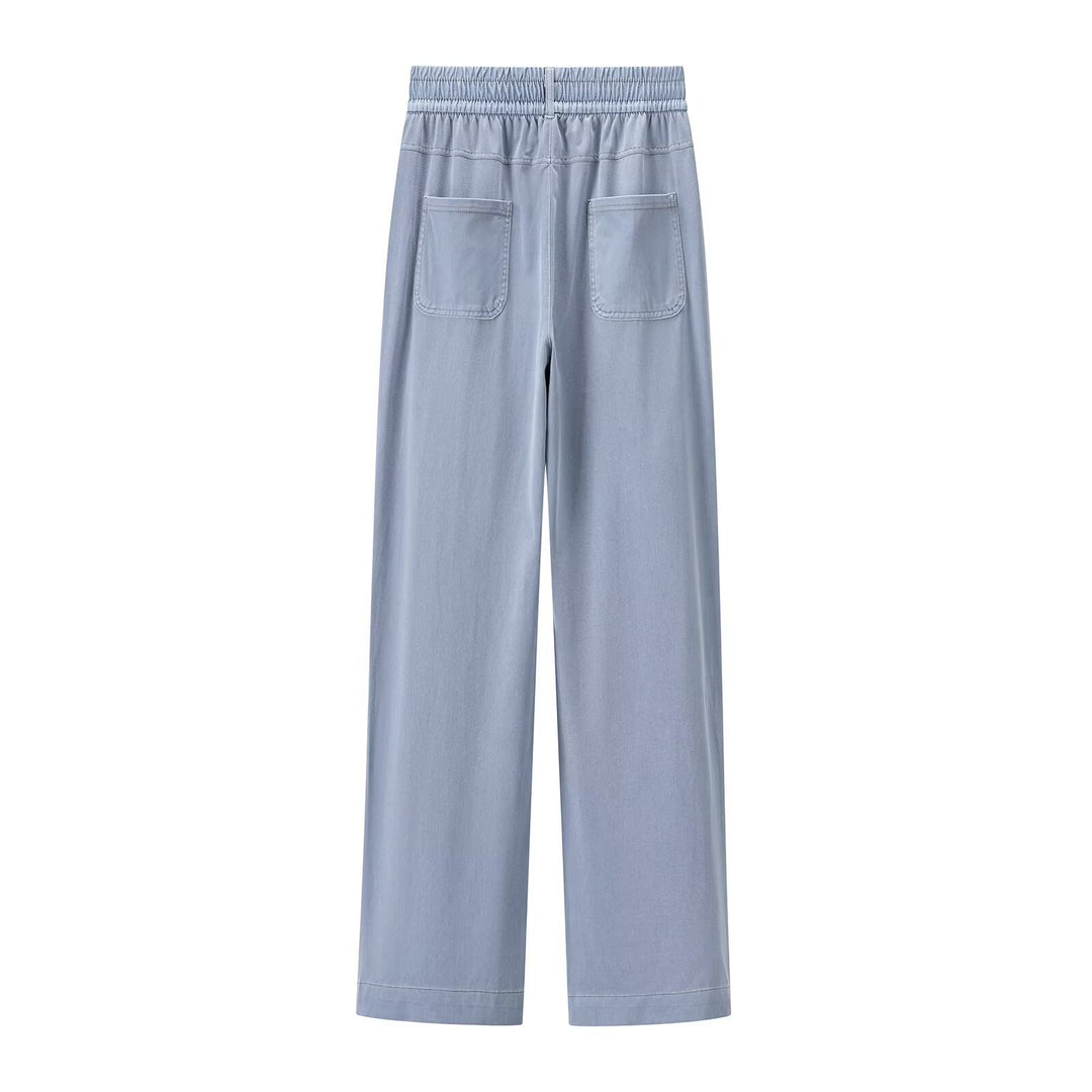 Women's loose high-waist lounge pants made of flowing viscose look with elastic waistband and side pockets Mune Fashion