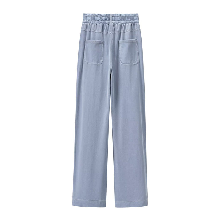 Women's loose high-waist lounge pants made of flowing viscose look with elastic waistband and side pockets Mune Fashion