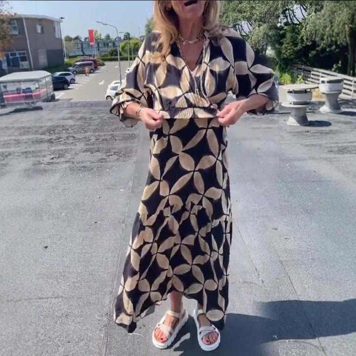 Women's maxi dress with geometric all-over print, smocked waist and ruffled tiers Mune Fashion