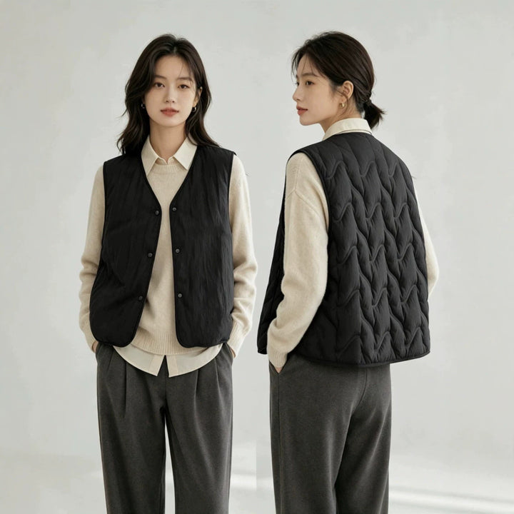 Women’s lightly padded quilted vest with V-neck and press studs Mune Fashion