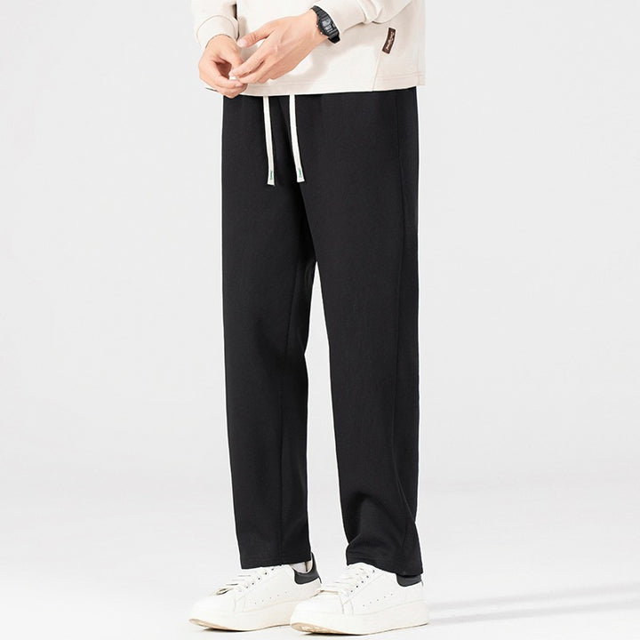 Men's loose-fitting fleece jogging pants with drawstring waistband and elastic leg cuffs Mune Fashion