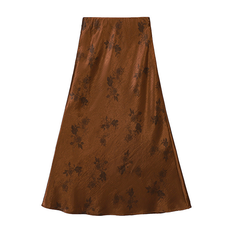 Women's high-waisted A-line midi skirt in jacquard-like satin with floral relief print.