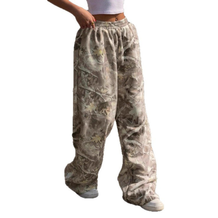 Women's wide Palazzo pants with floral all-over print and elastic waistband Mune Fashion