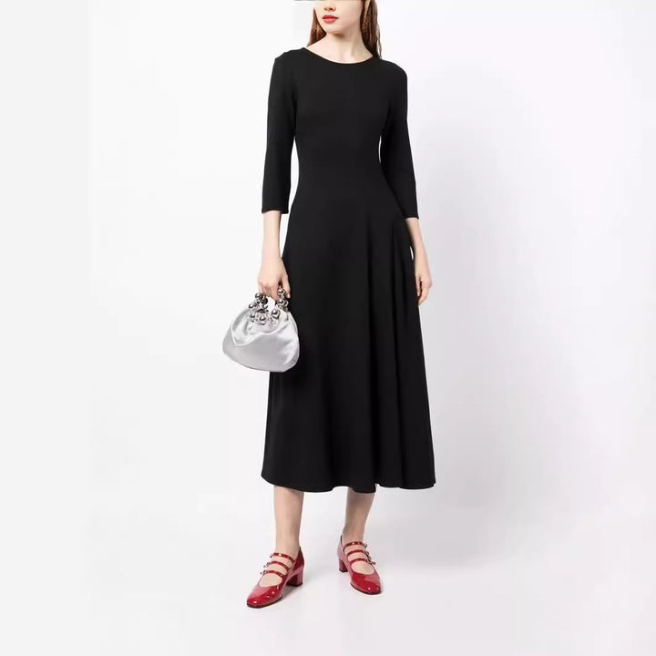 Women Elegant Midi Dress with tailored A-line cut and three-quarter sleeves Mune Fashion
