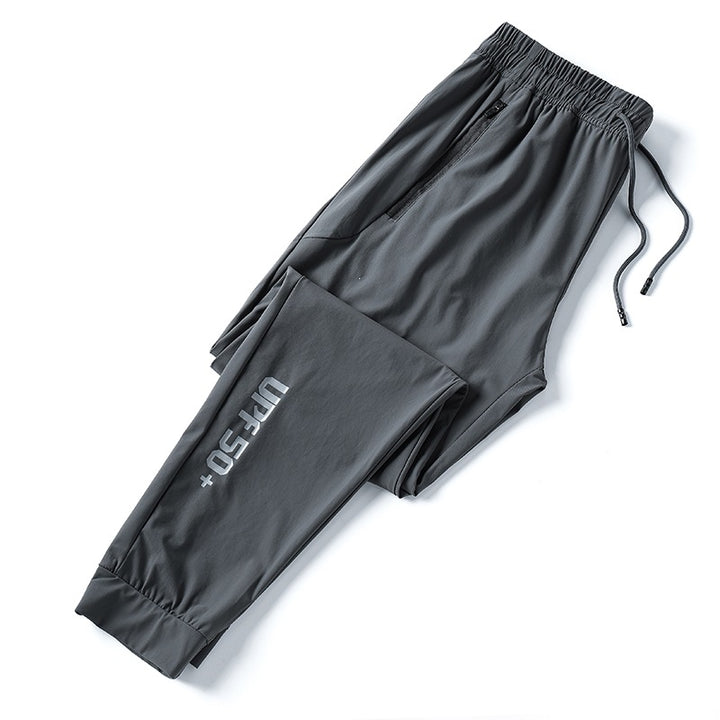 Men's sporty training pants with practical zip pockets Mune Fashion