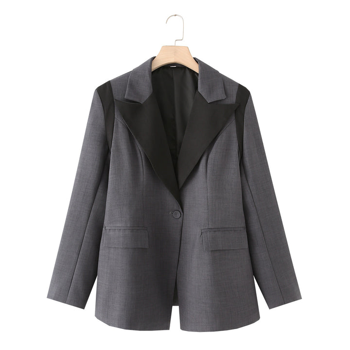 Women's oversized blazer with contrasting lapel, single-button placket, and flap pockets Mune Fashion