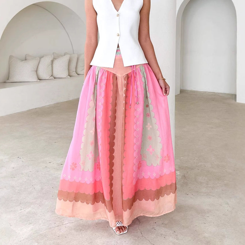 Women's flowing maxi skirt with V-shaped yoke, narrow drawstring waist and printed scallop pattern Mune Fashion