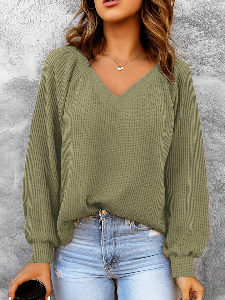 Women's fine structure knit sweater with V-neck, balloon sleeves, and ribbed cuffs Mune Fashion