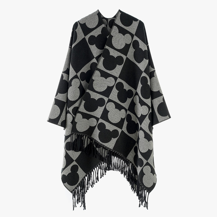 Women's jacquard poncho with figurative head silhouette pattern, fringe and open drape