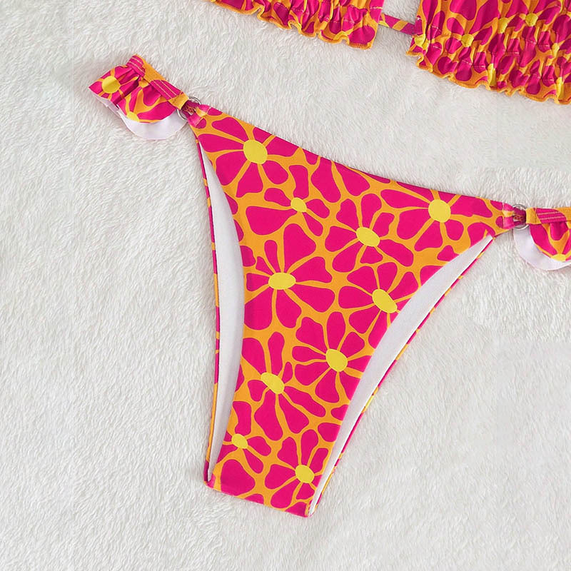 Ladies triangle bikini with playful flower design Mune Fashion