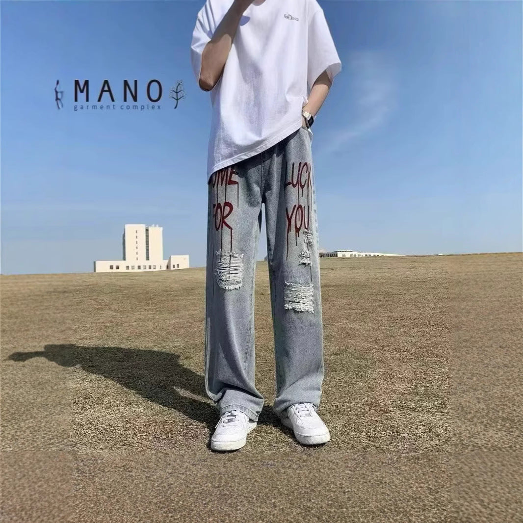 Ladies Fashion Destroyed Denim Jeans with Colorful Print Mune Fashion
