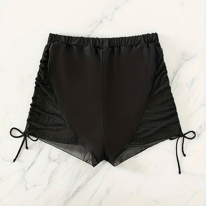 Women's swim shorts with elastic waistband and side ruffle details Mune Fashion