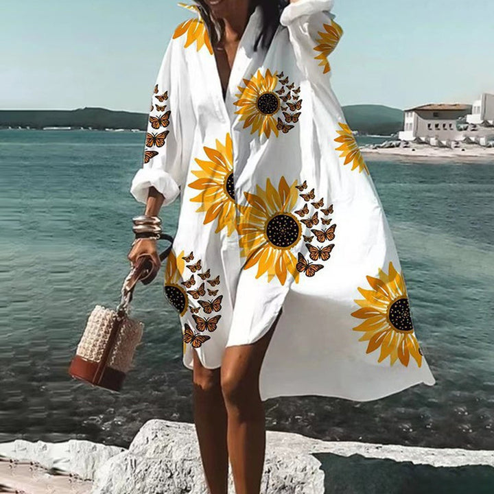 Women's airy beach dress kaftan with tropical leaf print and wide cut Mune Fashion