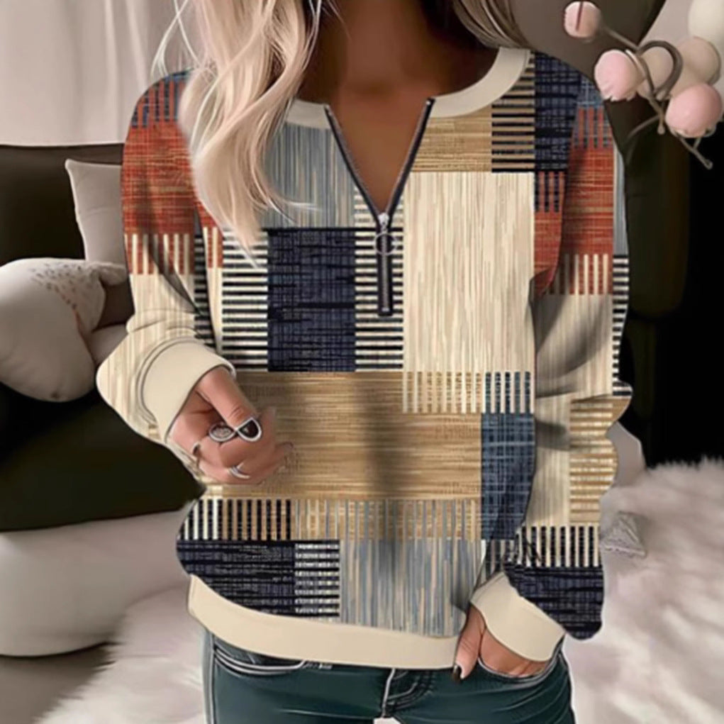 Women's cozy sweater with short zip, graphic patchwork pattern, extended sleeve cuffs, and ribbed hem Mune Fashion