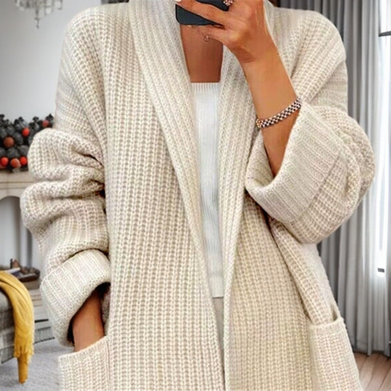 Women's longer oversized knitted coat with shawl collar and patch pockets Mune Fashion