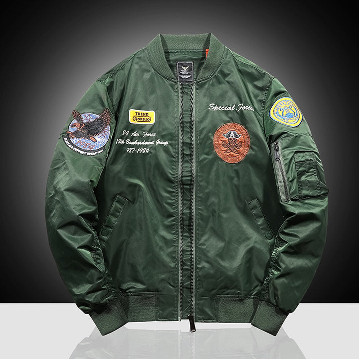 Men's bomber jacket in military patch style with sleeve utility pocket and ribbed collar Mune Fashion