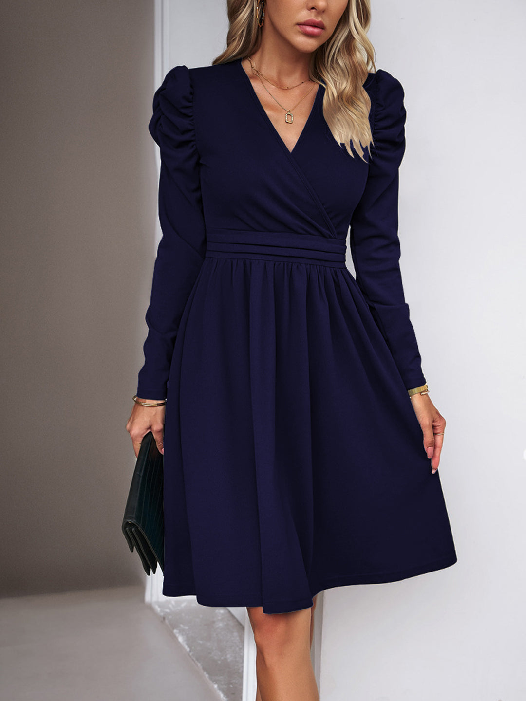 Women's wrap dress with V-neck, gathered puff sleeves, and fitted pleated skirt Drune