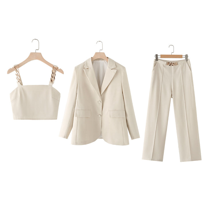 Ladies' three-piece suit set with chain crop top, loose blazer, and high-waisted pleated trousers Mune Fashion