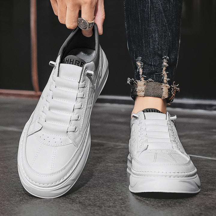 Unisex minimalist platform sneaker made of textured synthetic leather with padded heel collar and sculpted outsole Mune Fashion