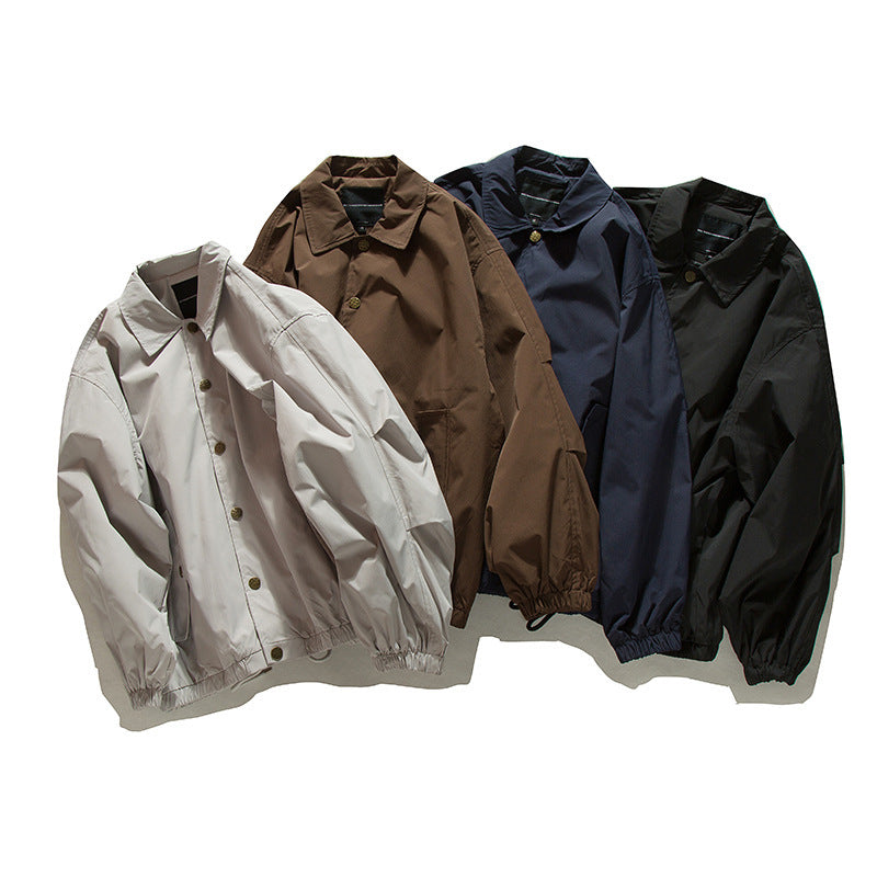 Unisex Boxy transitional bomber jacket with drawstring hem and snap button placket Mune Fashion