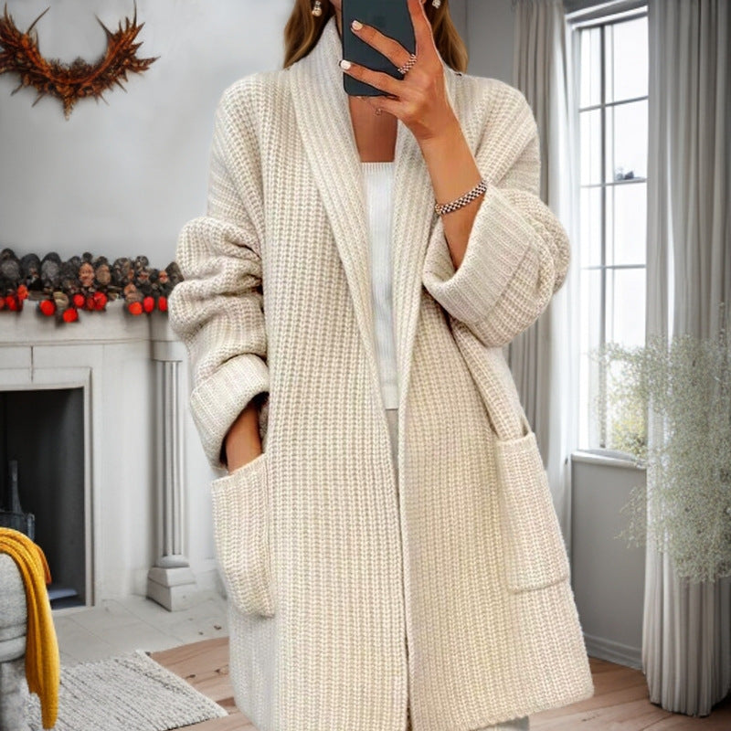 Women's longer oversized knitted coat with shawl collar and patch pockets Mune Fashion