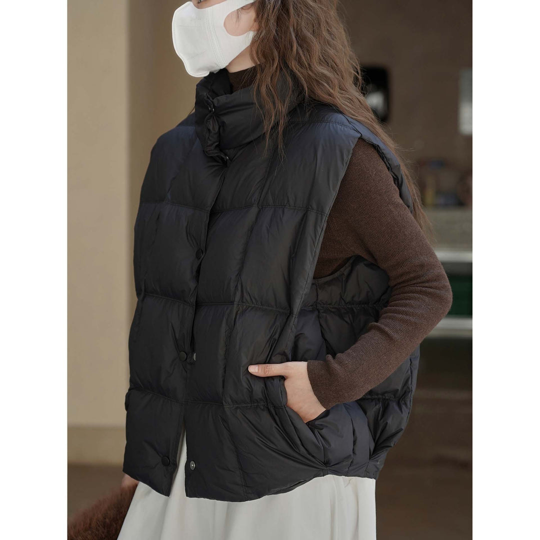 Women's lightweight quilted vest with high collar and snap button placket Mune Fashion