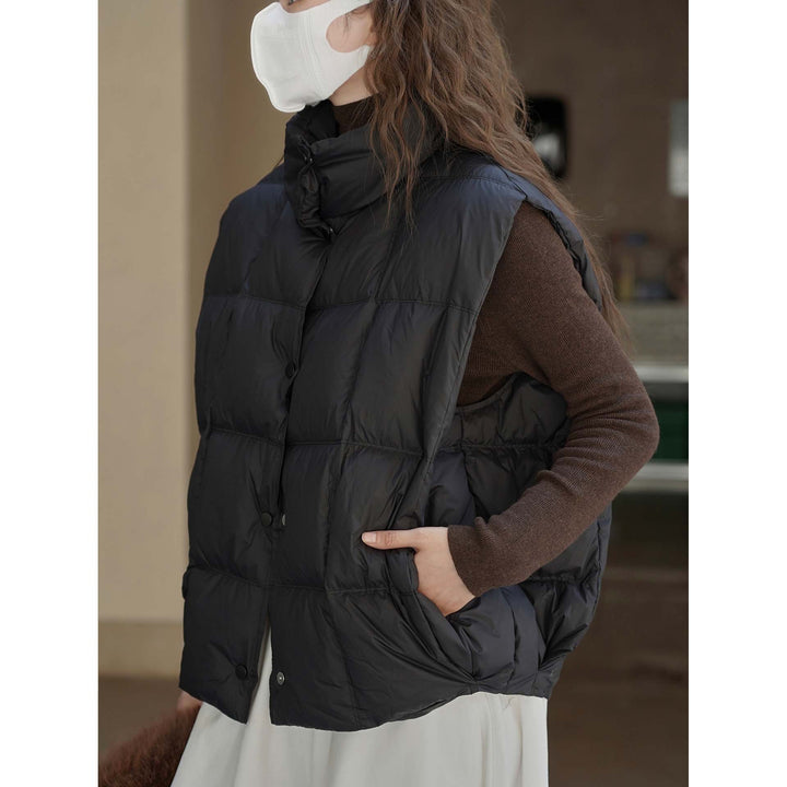 Women's lightweight quilted vest with high collar and snap button placket Mune Fashion