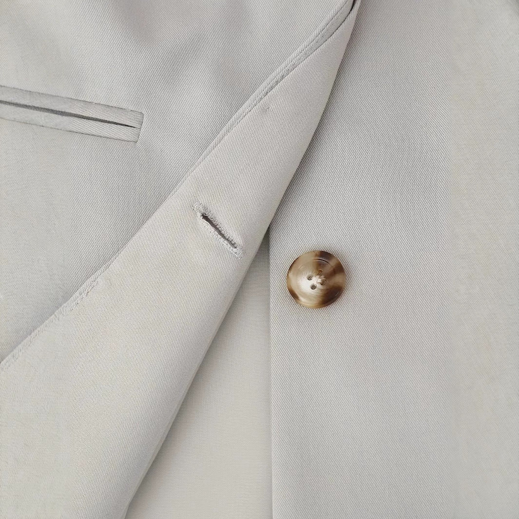 Women's minimalist V-neck blazer jacket with concealed placket and narrow welt pockets Mune Fashion