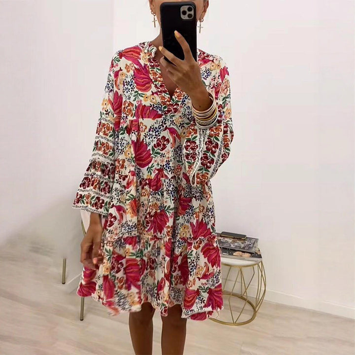 Ladies' floral ruffle mini dress in Boho style with V-neck and tiered silhouette Mune Fashion