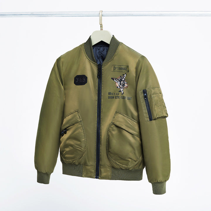 Men's  padded pilot-style bomber jacket with embroidered jet motif and dual angled front cargo pockets Mune Fashion