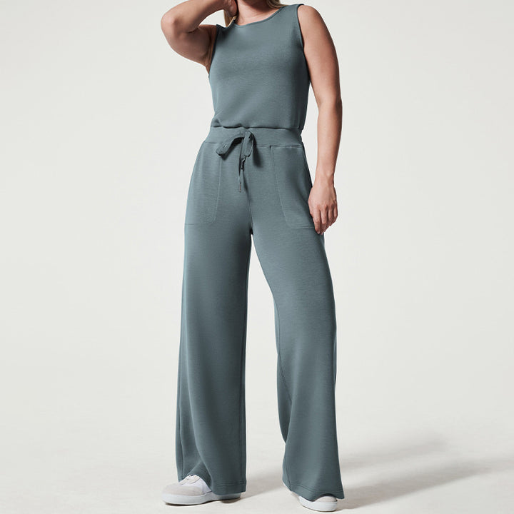 Women's sleeveless knitted jumpsuit with wide palazzo legs, drawstring waistband, and patch pockets Mune Fashion