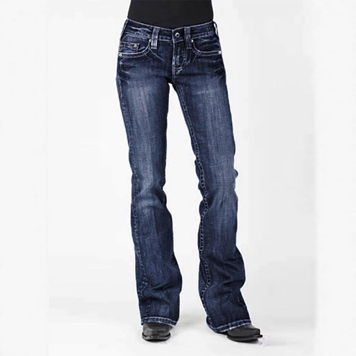 Ladies elegant bootcut jeans with a high waistband and subtle wash