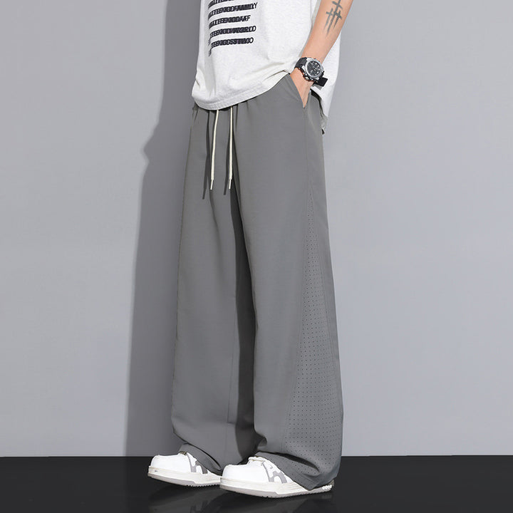 Men's Loose-Fitting Sports Pants with Breathable Mesh Inserts
