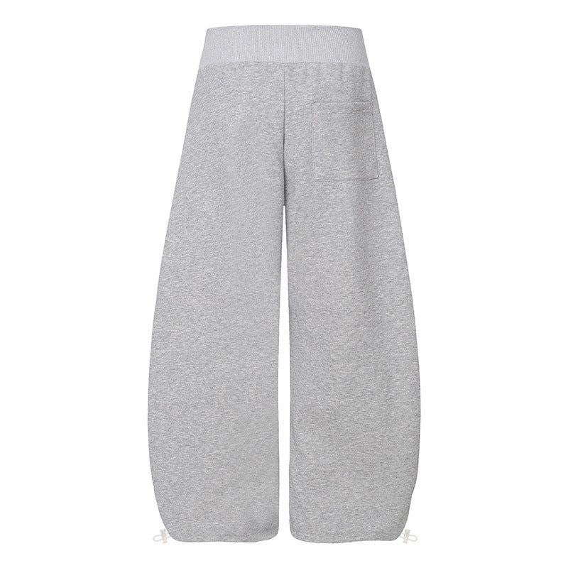 Women's culotte lounge pants with high ribbed waistband, front decorative button placket and adjustable hem Mune Fashion