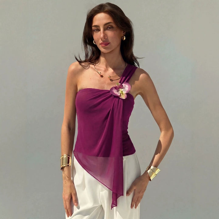Women’s asymmetrical one-shoulder chiffon top with draping and decorative brooch Mune Fashion