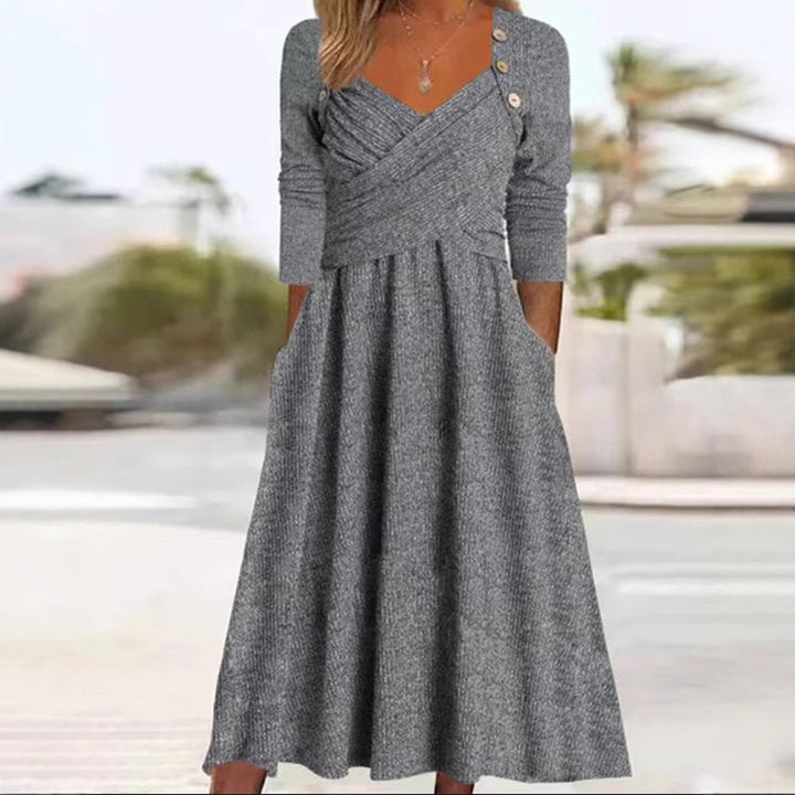 Women's knitted maxi dress with wrap top V-neck, side pockets and decorative button placket Mune Fashion