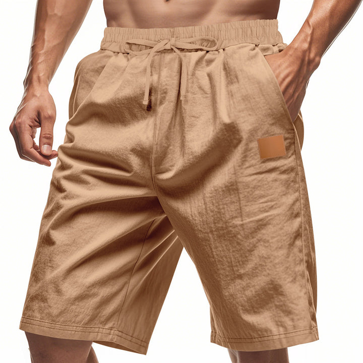 Men's lightweight casual Bermuda shorts with elastic waistband, drawstring and discreet leather application Mune Fashion