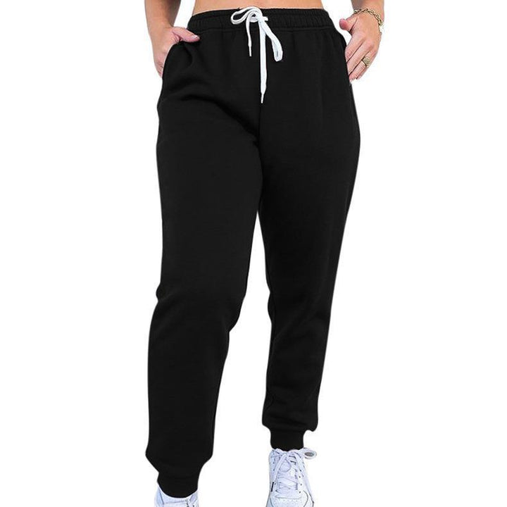 Women's tapered jogging pants at ankle height with elastic comfort waistband, adjustable drawstring, and deep side pockets Mune Fashion