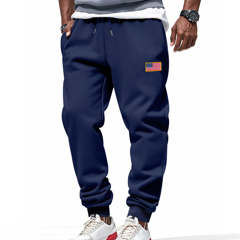 Men's slim-fit sweatpants with tapered leg, elastic drawstring waistband, and discreet flag application Mune Fashion