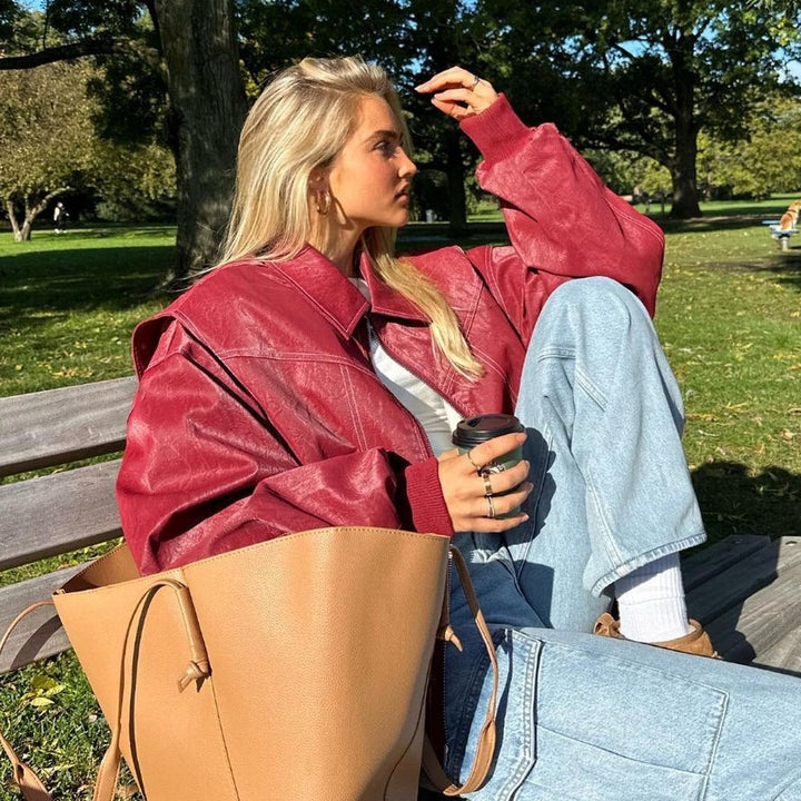 Women oversized faux leather bomber jacket with continuous zipper, oversized collar and ribbed cuffs Mune Fashion
