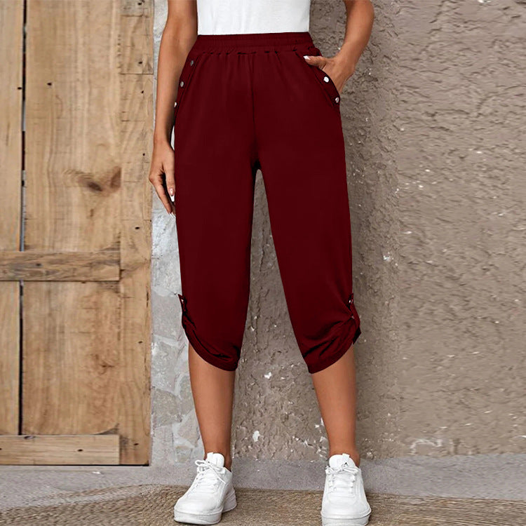 Women's casual three-quarter length pants with elastic waistband, side pockets and roll-up hem Mune Fashion
